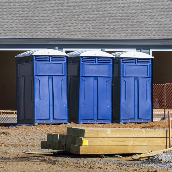 what is the cost difference between standard and deluxe porta potty rentals in Whitley City